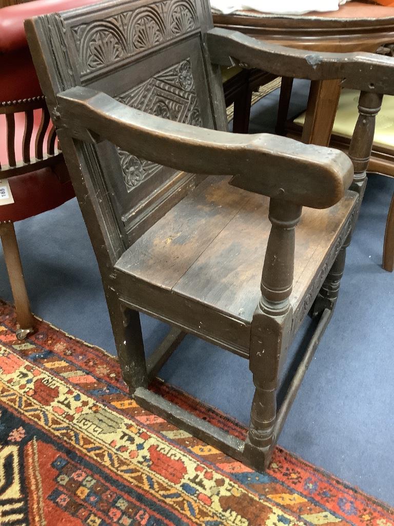 An oak wainscot chair, width 59cm, depth 50cm, height 86cm